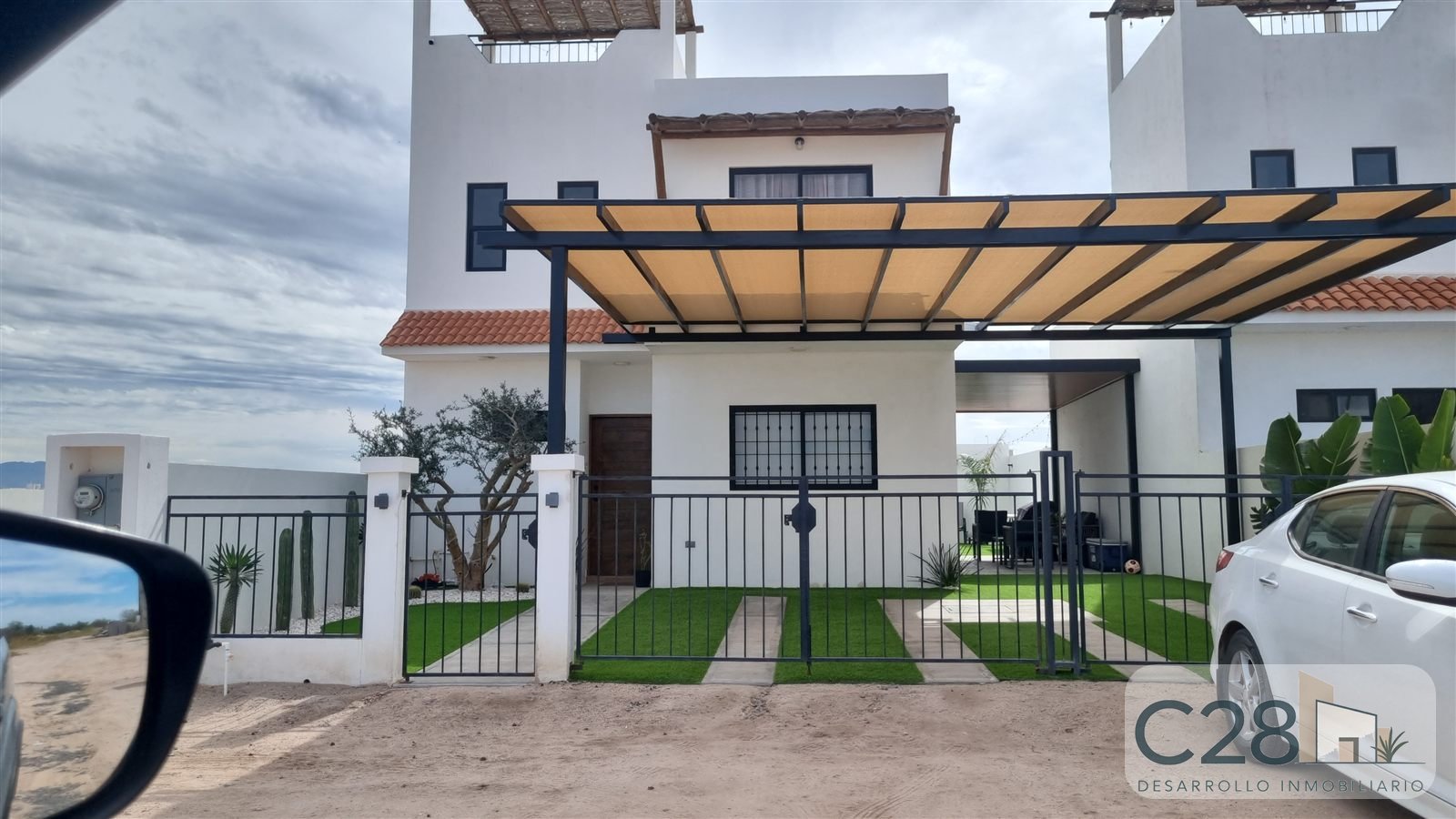 Fachada terminada con jardín de Habitacional Paraíso de La Paz